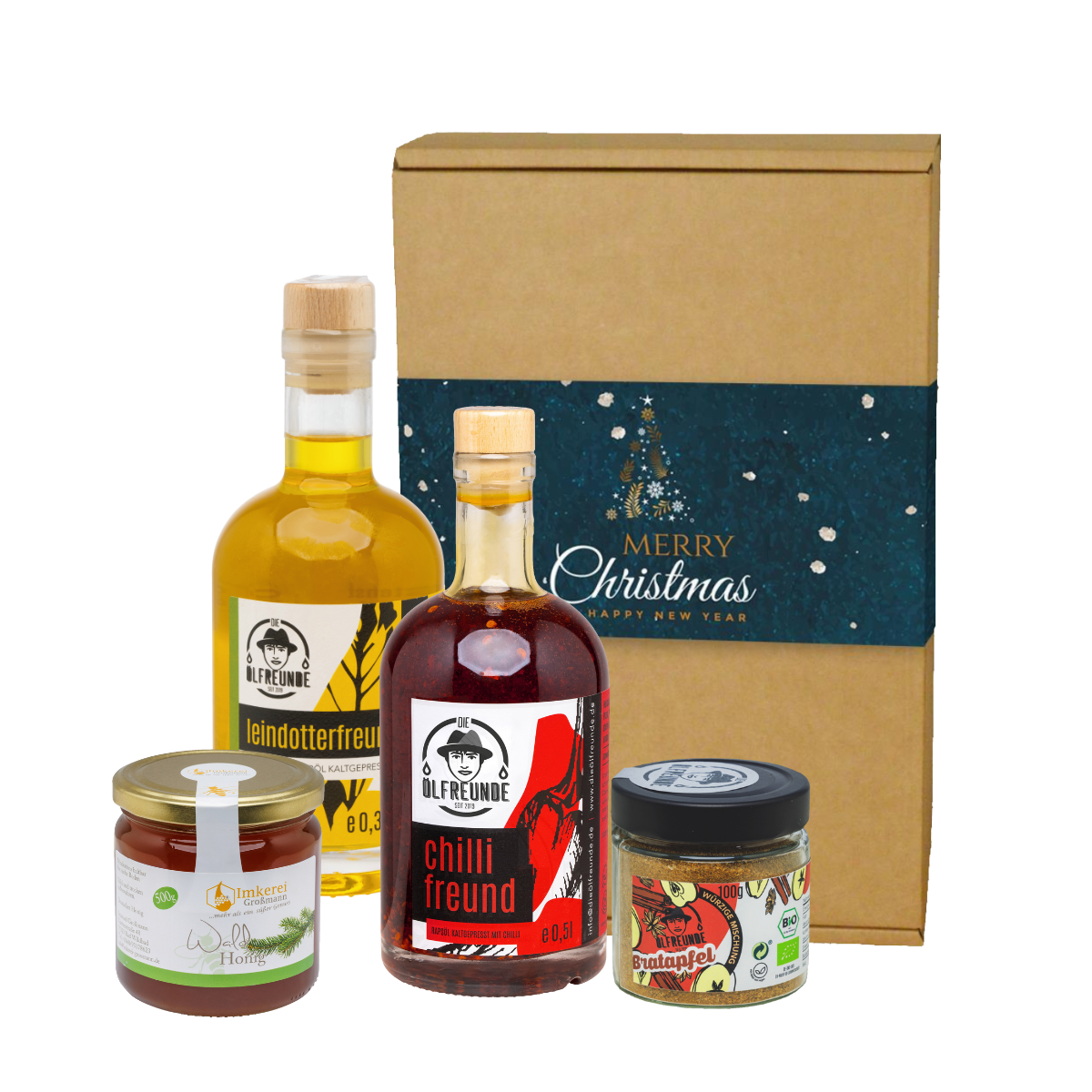Eine Flasche Leindotteröl, Chilliöl und ein Glas Bratapfel-Gewürzmischung der Marke Die Ölfreunde, dazu ein Glas Waldhonig der Imkerei Großmann, vor einer Weihnachts-Geschenkeverpackung.