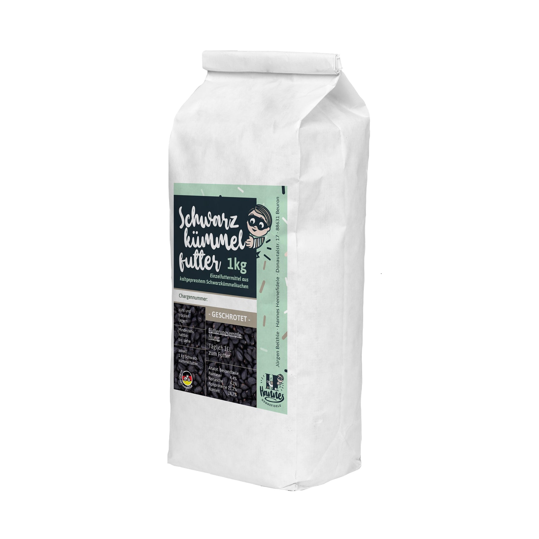 Eine Tüte mit 1000g geschrotetes Schwarzkümmelfutter der Marke Hannes.