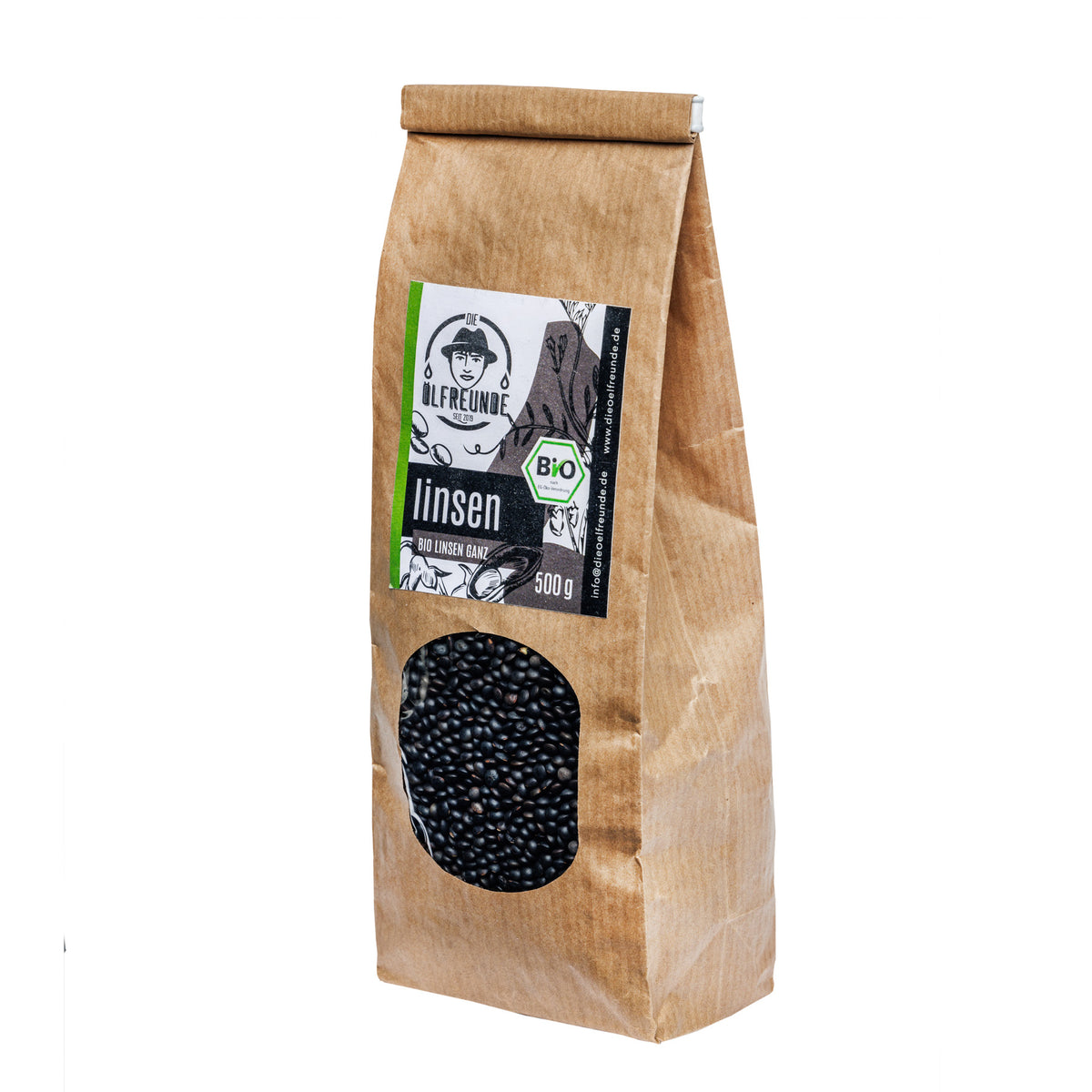 Papiertüte mit ganzen, schwarzen Bio-Linsen der Marke Die Ölfreunde.
