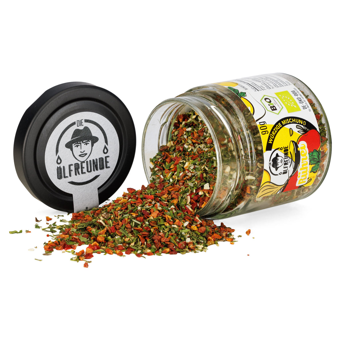 90g Bio-Rühreigewürz der Marke Die Ölfreunde, im Glas mit gelbem Etikett, daneben eine kleine Portion Gewürzpulver.