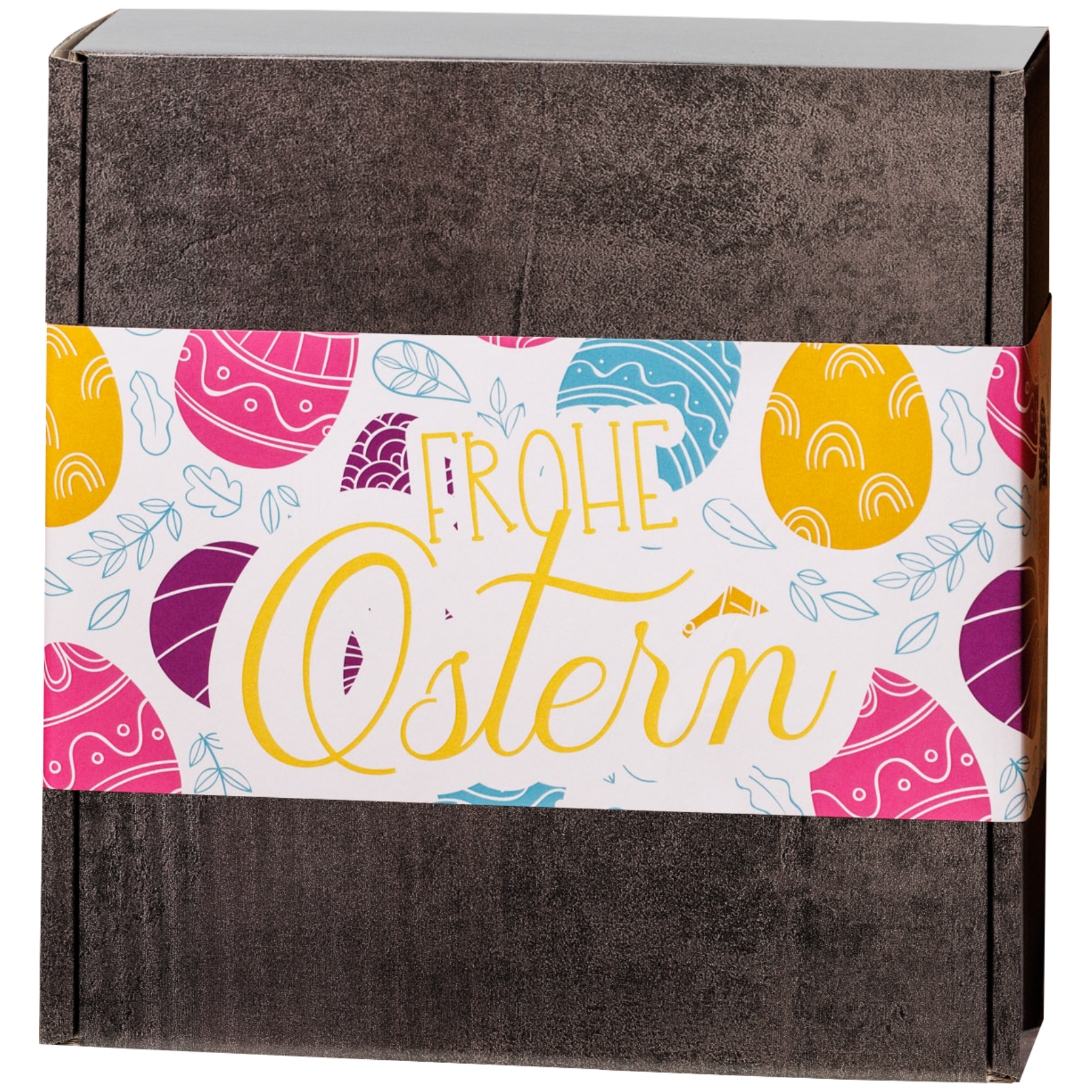 Rechteckige, graue Geschenkverpackung, umhüllt von einem bunten Band, mit Ostereiern und einem Schriftzug ‚Frohe Ostern‘ darauf.