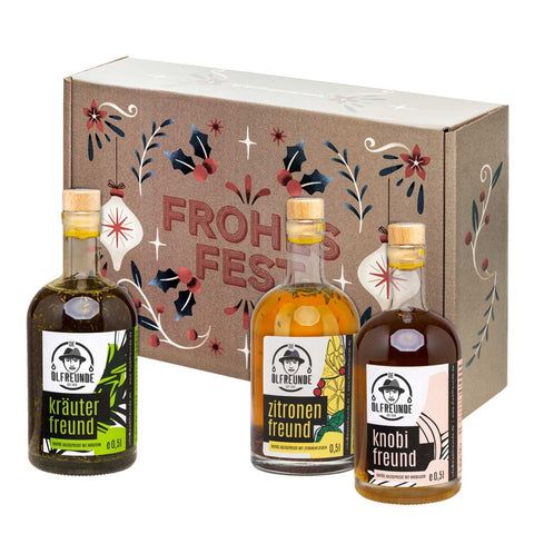Geschenkset mit 3 Öl Flaschen 500 ml, Kräuterfreund, Zitronenfreund, knobifreund. Brauner Kartn mit Weihnachtlichen Aufdruck und Frohes Fest Schrift.
